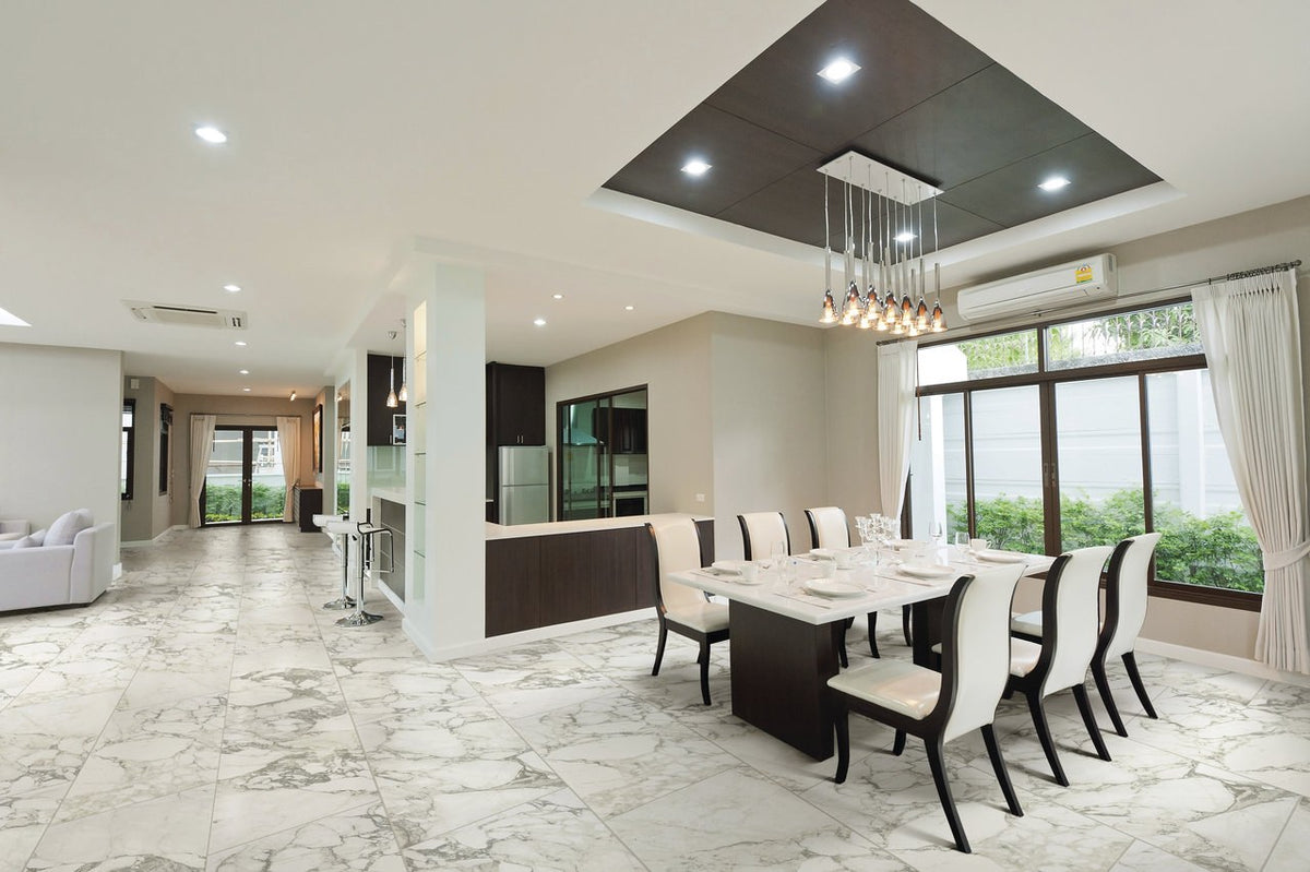 Carrara Select Arabescato Polished Marble Look Porcelain Tiles 12x24 installed in a kitchen