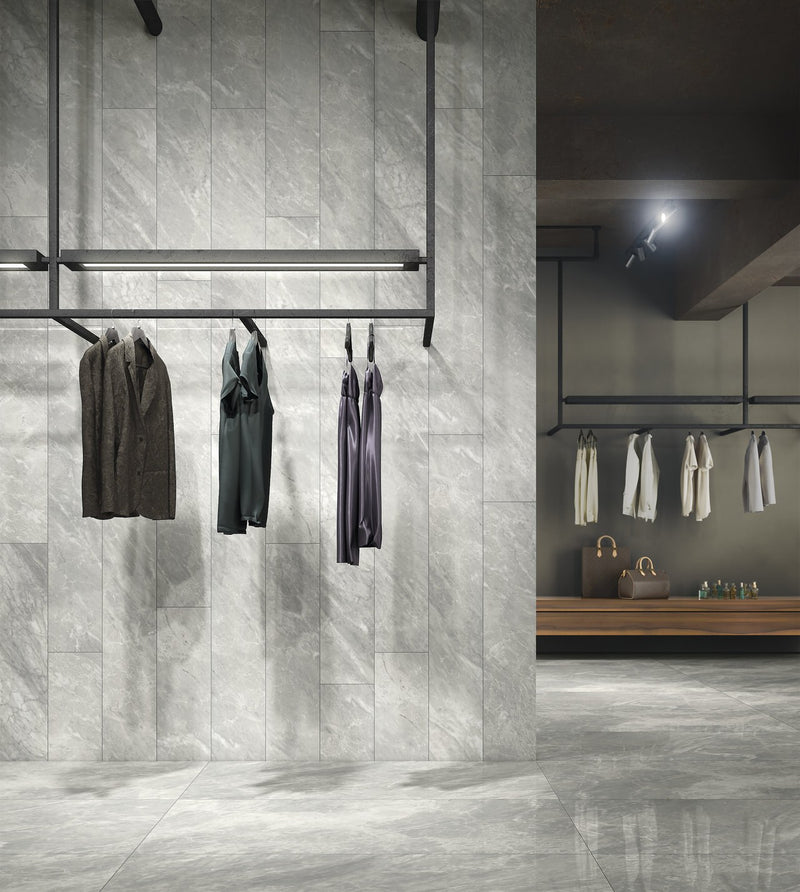 Carrara Select Blu Polished Marble Look Bullnose Porcelain Trim 4x24 installed in a shop, view 2