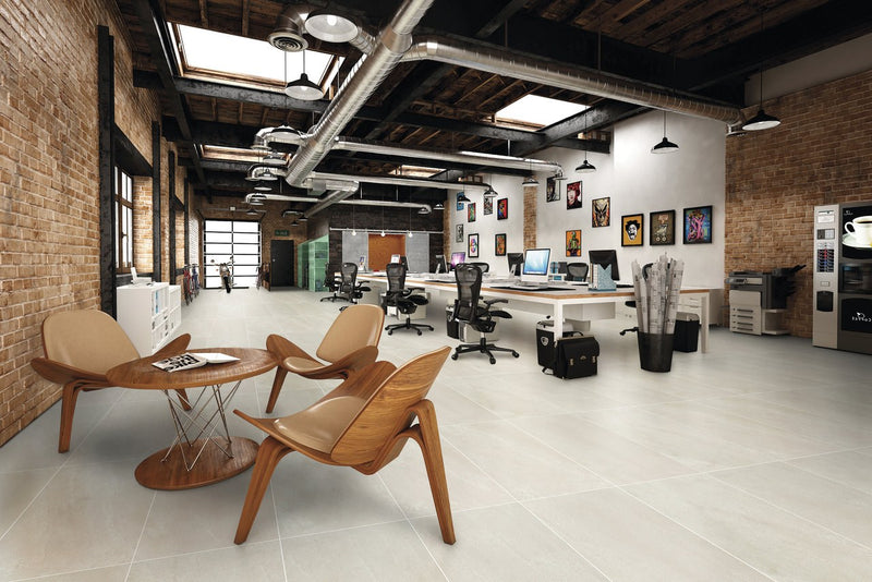 Carrara Select Gioia Honed Marble Look Bullnose Porcelain Trim 4x24 installed in an office