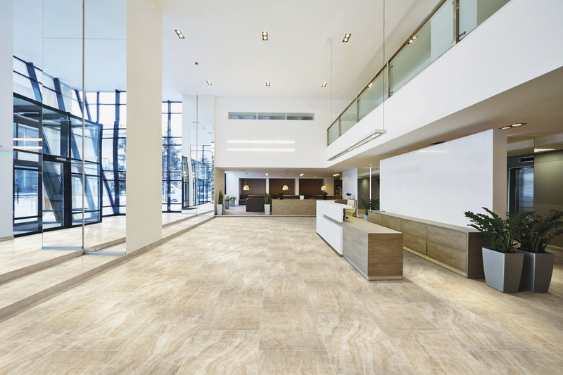 Carrara Select Paonazzo Polished Marble Look Bullnose Porcelain Trim 4x24 installed in a lobby