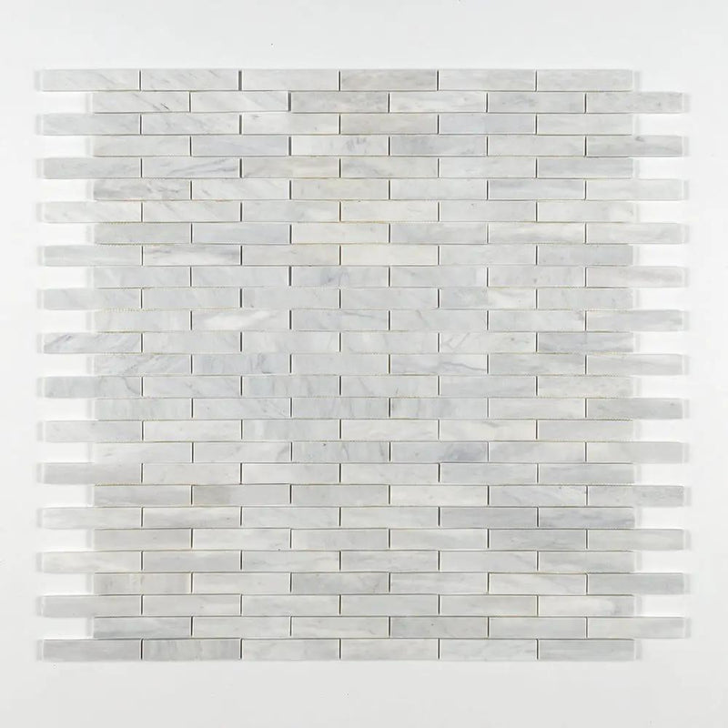 Carrara T Honed 1 1/4x6 Marble Mosaics 12x12 closeup 1