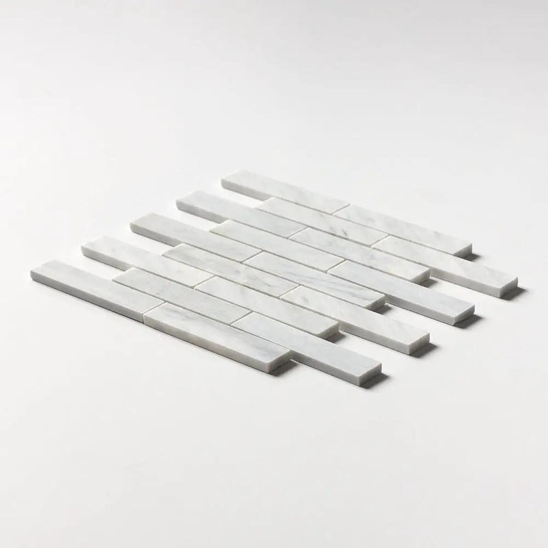 Carrara T Honed 1 1/4x6 Marble Mosaics 12x12 closeup 2