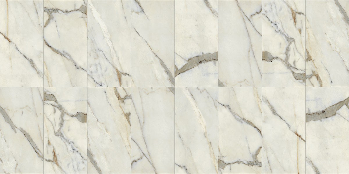 Classic 2.0 Calacatta Oro Polished Marble Look Porcelain Tiles 12x24, several pieces laid together