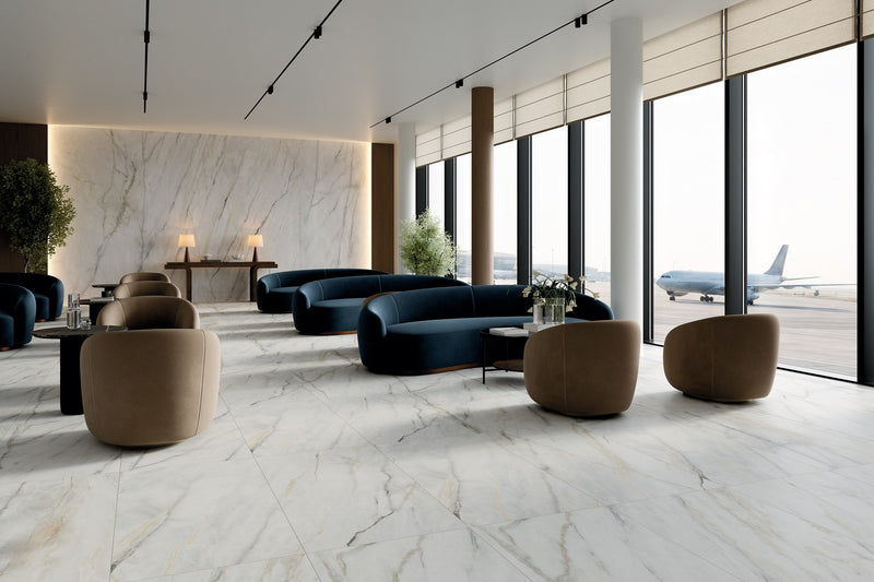 Classic Boutique Calacatta Bluette Natural Marble Look Porcelain Tiles 24x48 installed in an airport terminal