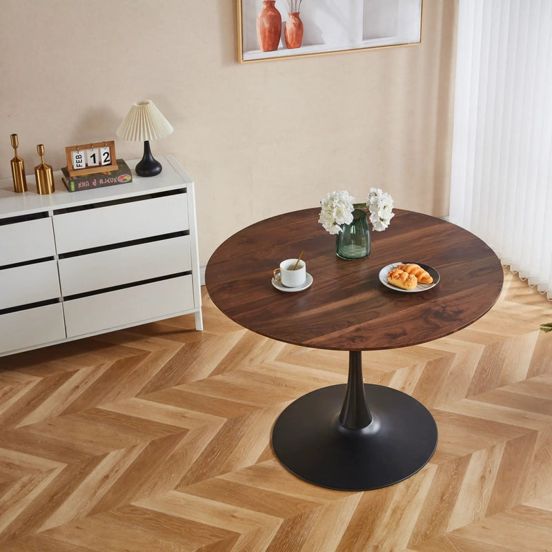 Mid-Century Tulip Dining Table With Round Top by HouseOfZazla