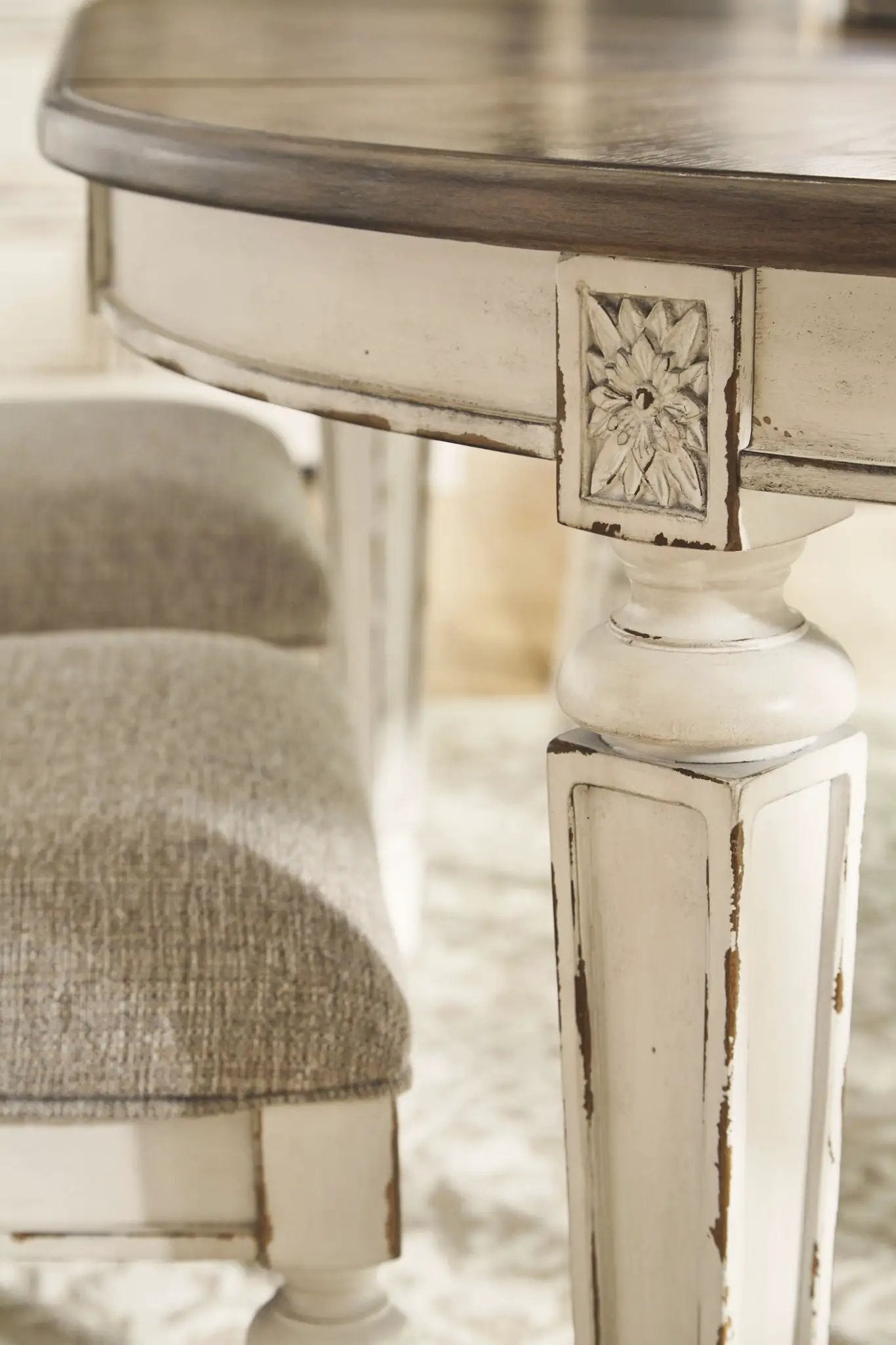 Realyn - Oval Dining Table Set by Unique Piece Furniture