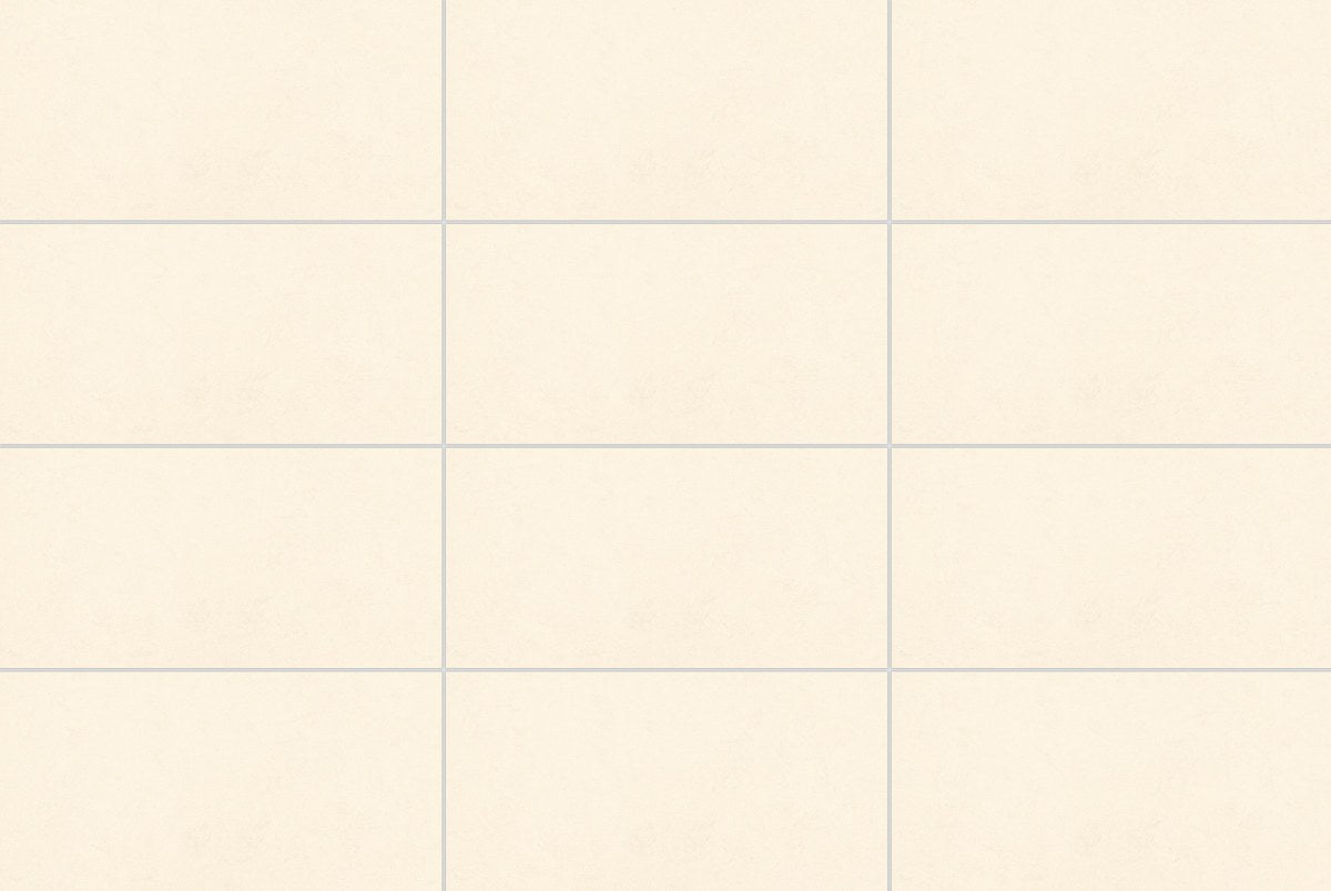 Deluxe 2.0 Crema Honed Stone Look Cove Base Porcelain Trim 6x12, several pieces laid together