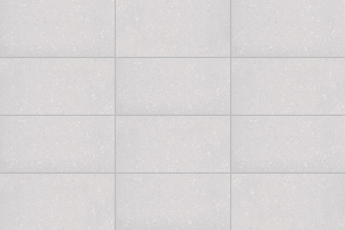Deluxe 2.0 Delorian Grey Polished Stone Look Porcelain Tiles 12x24, several pieces laid together