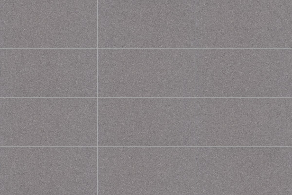 Deluxe 2.0 Ocean Storm Honed Stone Look Cove Base Porcelain Trim 6x12, several pieces laid together