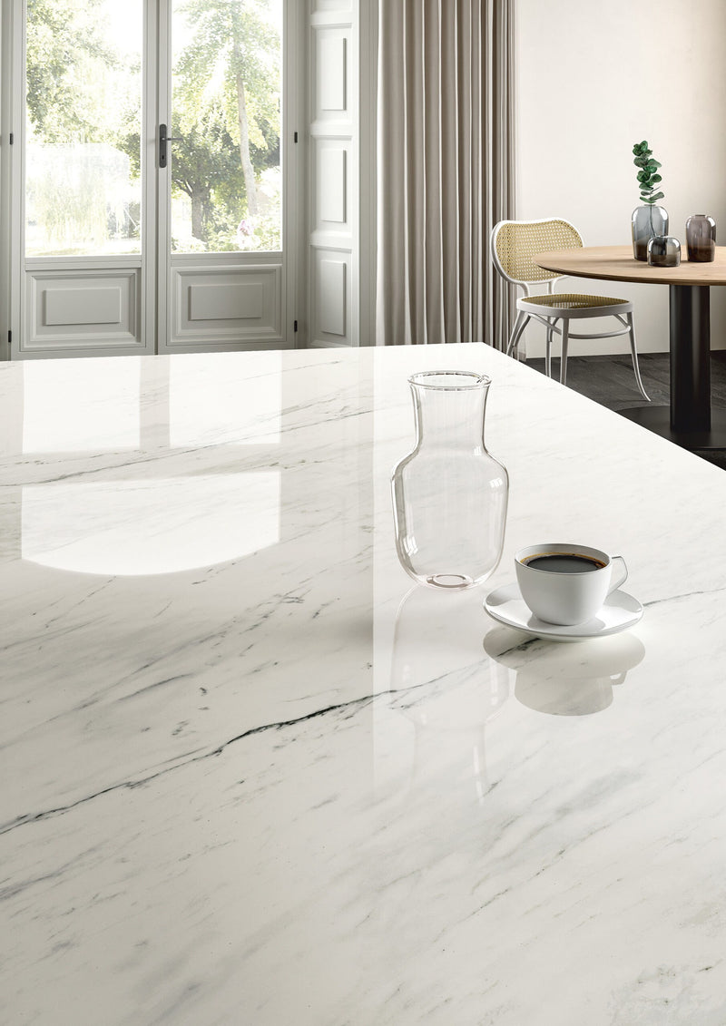 Dolcissima Luxe White Polished Marble Look Porcelain Slab 60x126 12mm Bookmatch A installed in a kitchen
