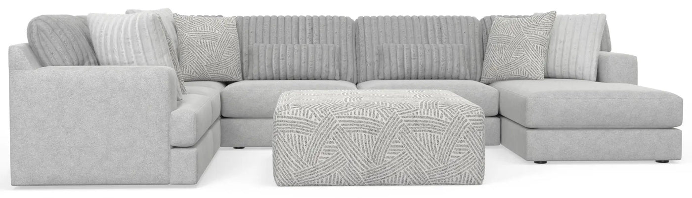 Logan - Upholstered Sectional With Comfort Coil Seating - 46" Cocktail Ottoman And Accent Pillows Included by Unique Piece Furniture