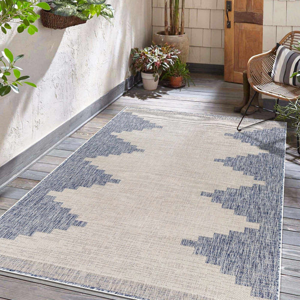 Djugun Blue Indoor & Outdoor Rug, installed in a room