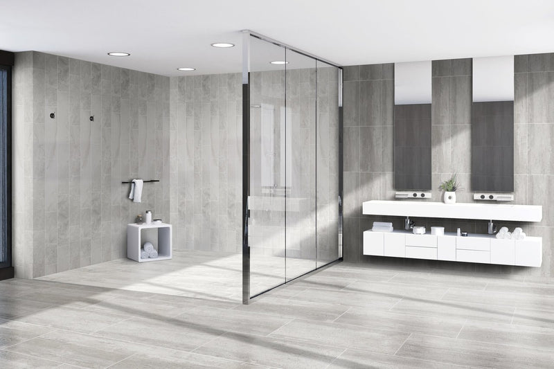 Ecocrete Aqua Honed Concrete Look Bullnose Porcelain Trim 3x24 installed in a bathroom