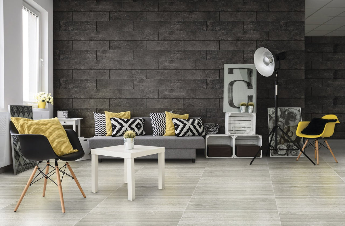 Ecocrete Aqua Honed Concrete Look Cove Base Porcelain Trim 6x12 installed in a living room, view 2