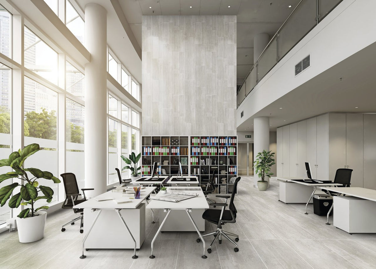 Ecocrete Aqua Honed Concrete Look Cove Base Porcelain Trim 6x12 installed in an office