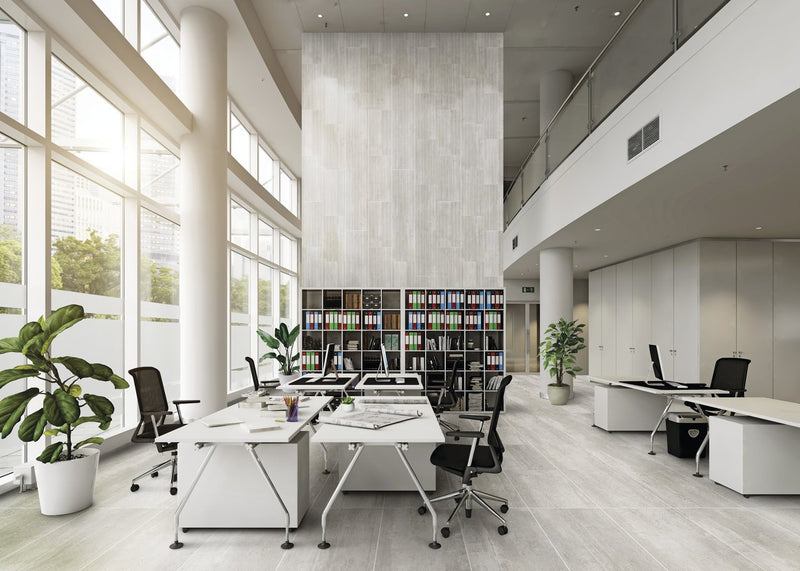 Ecocrete Aqua Honed Concrete Look Cove Base Porcelain Trim 6x12 installed in an office