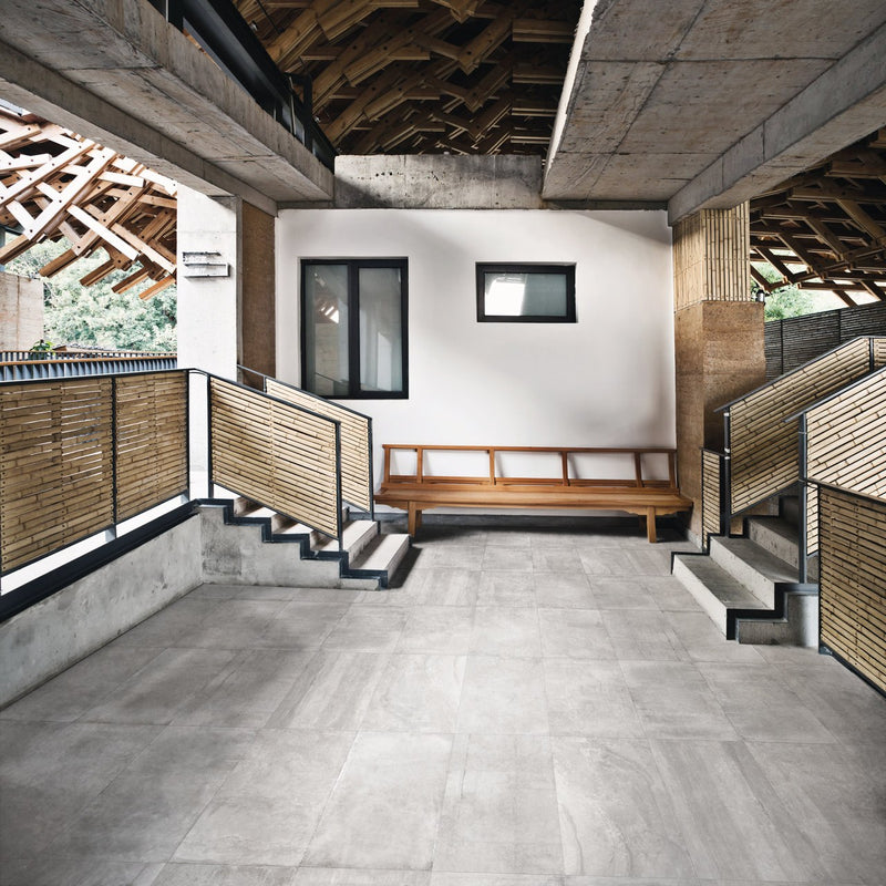 Ecocrete Aqua Honed Concrete Look Porcelain Tiles 18x36 installed in a living room