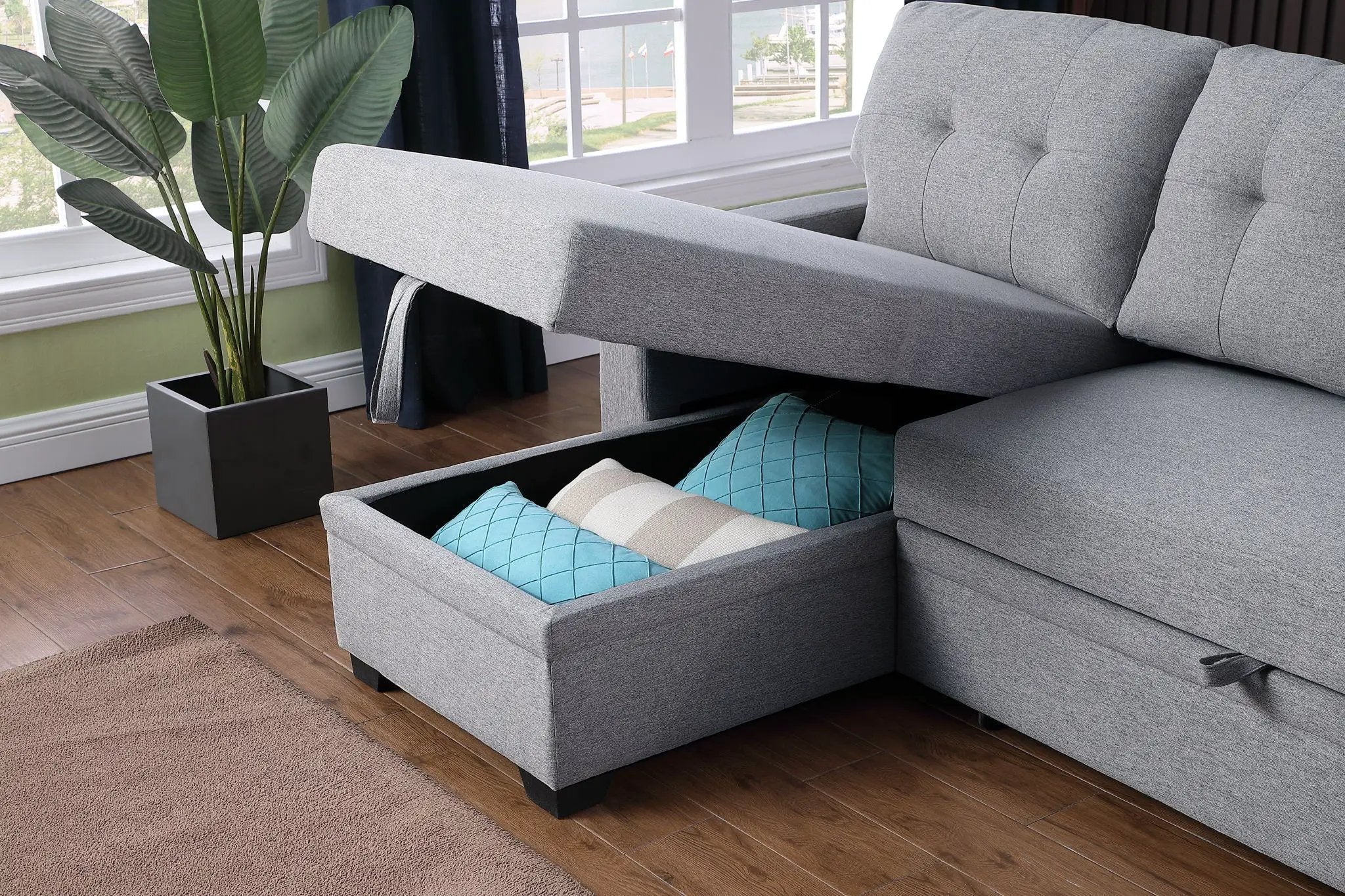 Upholstered Pull Out Sectional Sofa With Chaise by Unique Piece Furniture