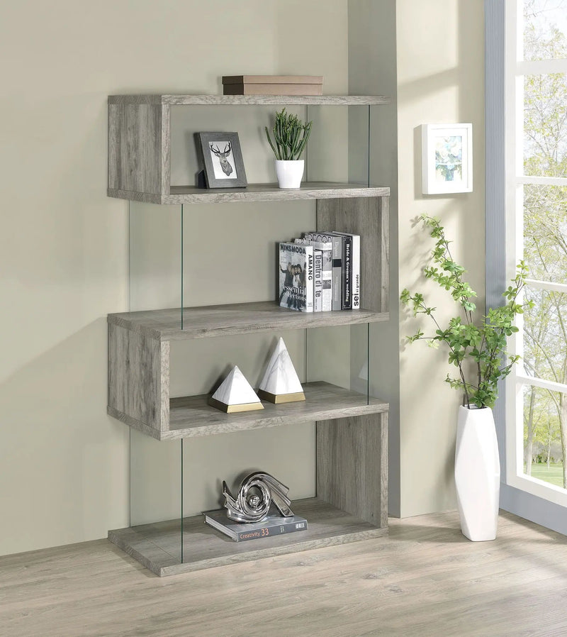 Emelle 63-inch 4-shelf Glass Panel Bookshelf Grey Driftwood by Unique Piece Furniture