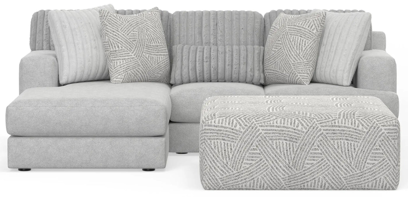 Logan - Upholstered Sectional With Comfort Coil Seating - 46" Cocktail Ottoman And Accent Pillows Included by Unique Piece Furniture