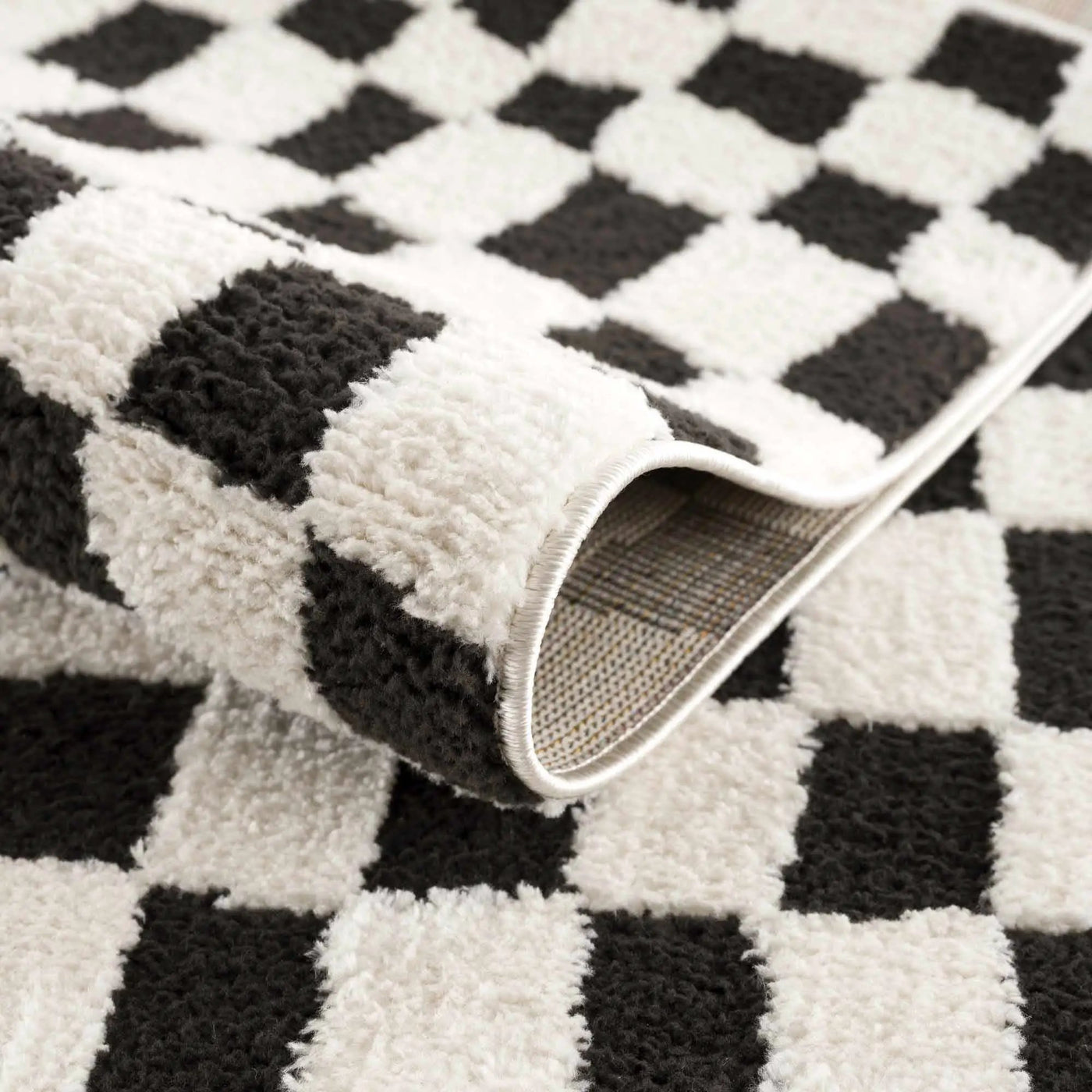 Lajos Black & White Checkered Plush Rug by Boutique Rugs