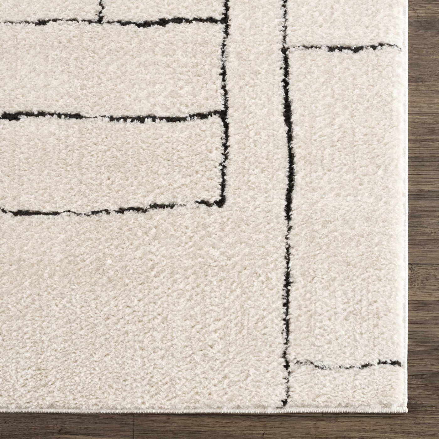 Keats Black & White Area Rug by Boutique Rugs