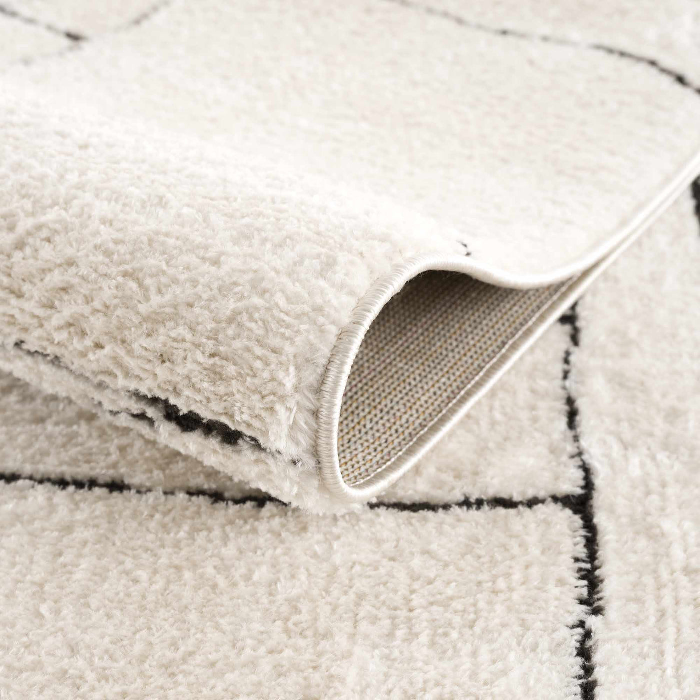 Keats Black & White Area Rug by Boutique Rugs