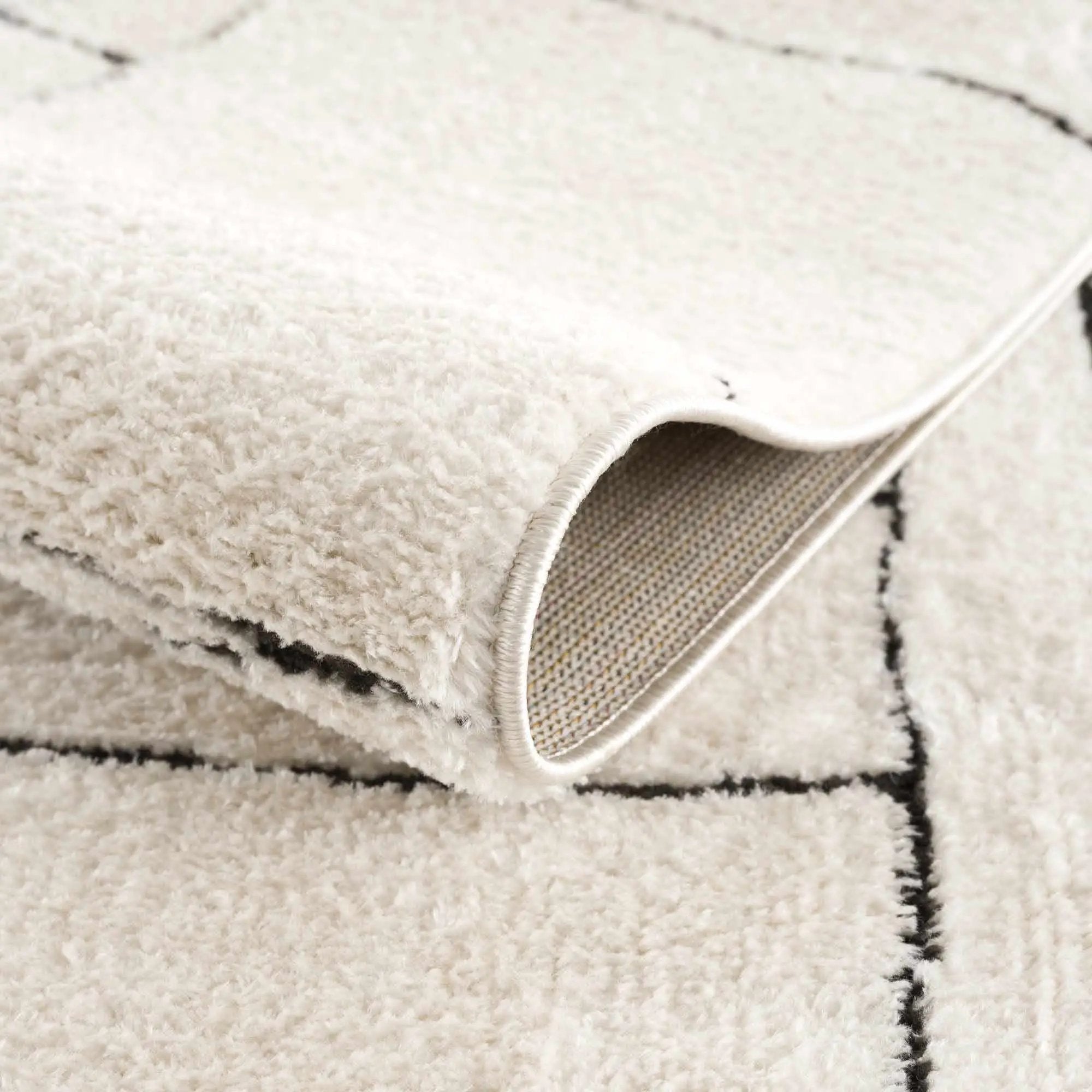 Keats Black & White Area Rug by Boutique Rugs