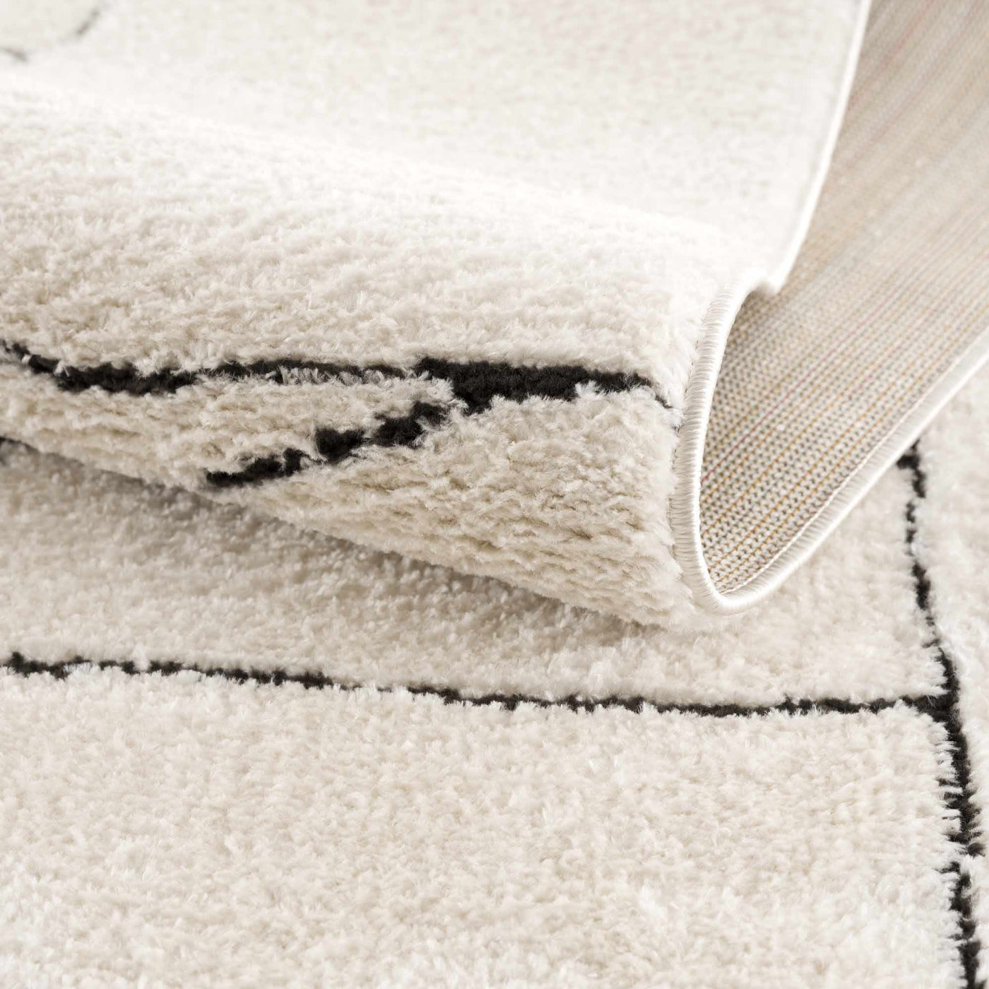 Keats Black & White Area Rug by Boutique Rugs