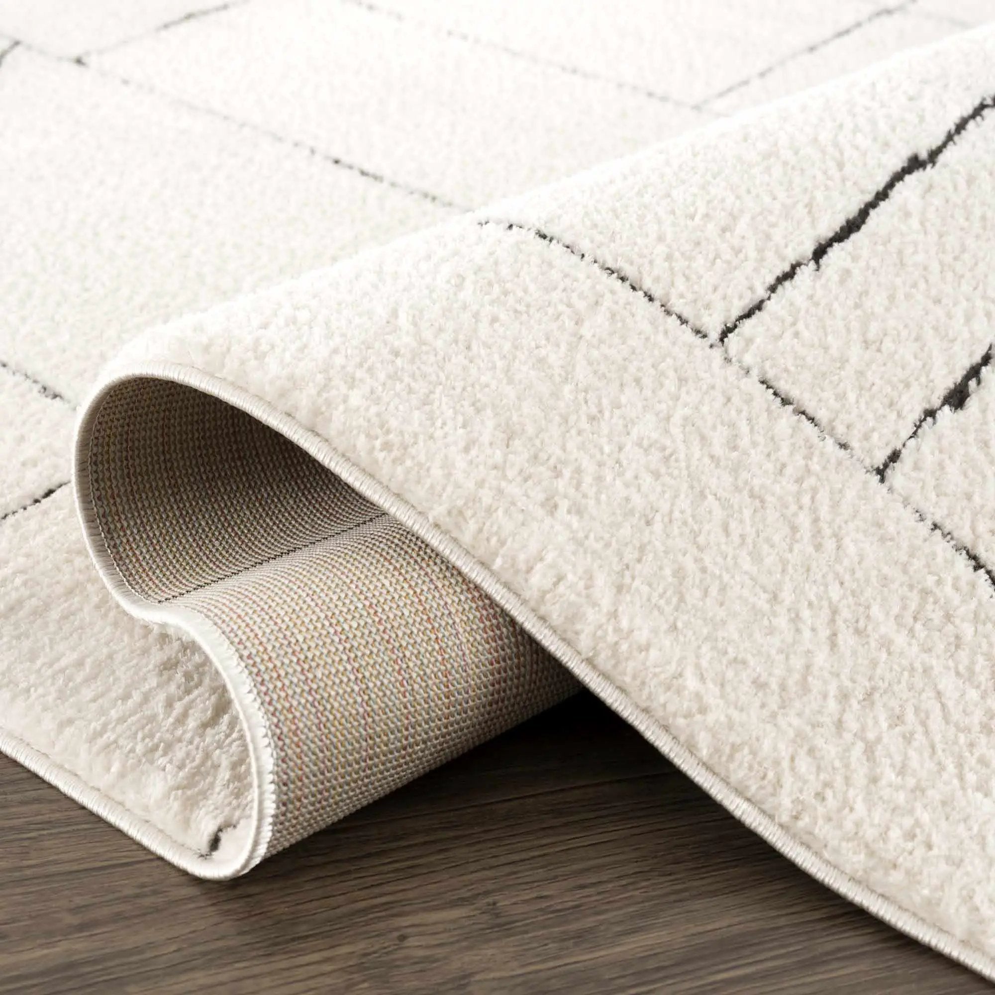 Keats Black & White Area Rug by Boutique Rugs