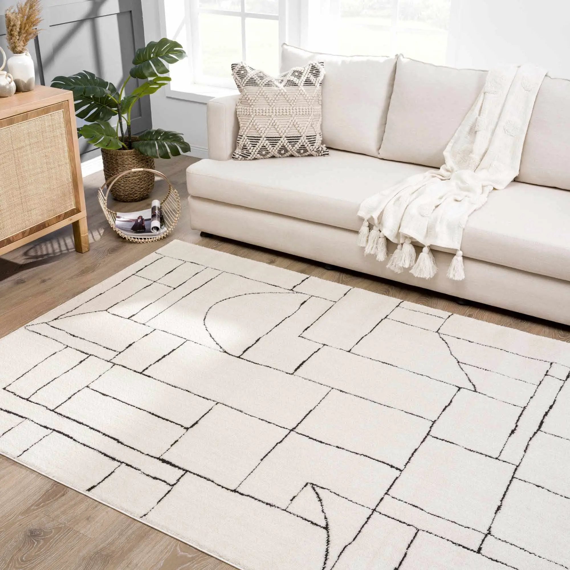 Keats Black & White Area Rug by Boutique Rugs