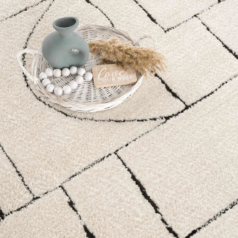 Keats Black & White Area Rug by Boutique Rugs