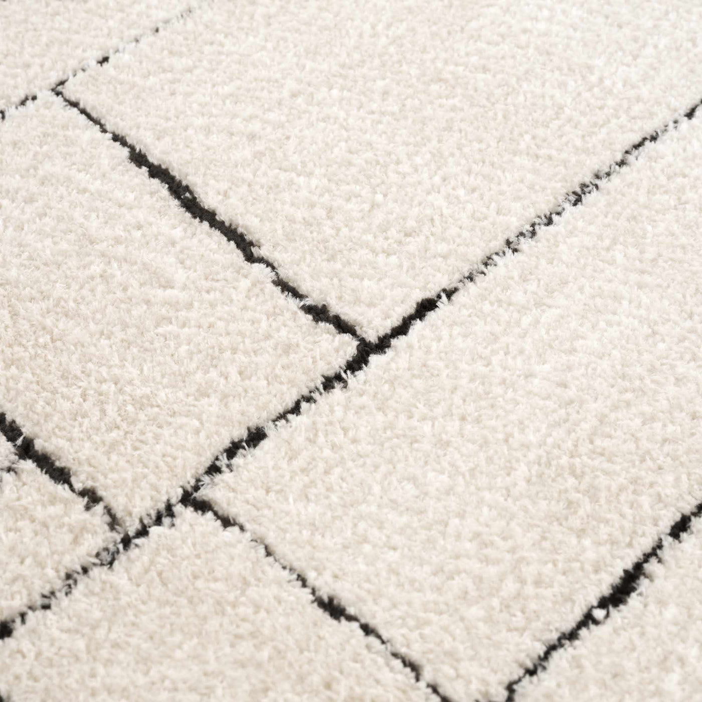 Keats Black & White Area Rug by Boutique Rugs