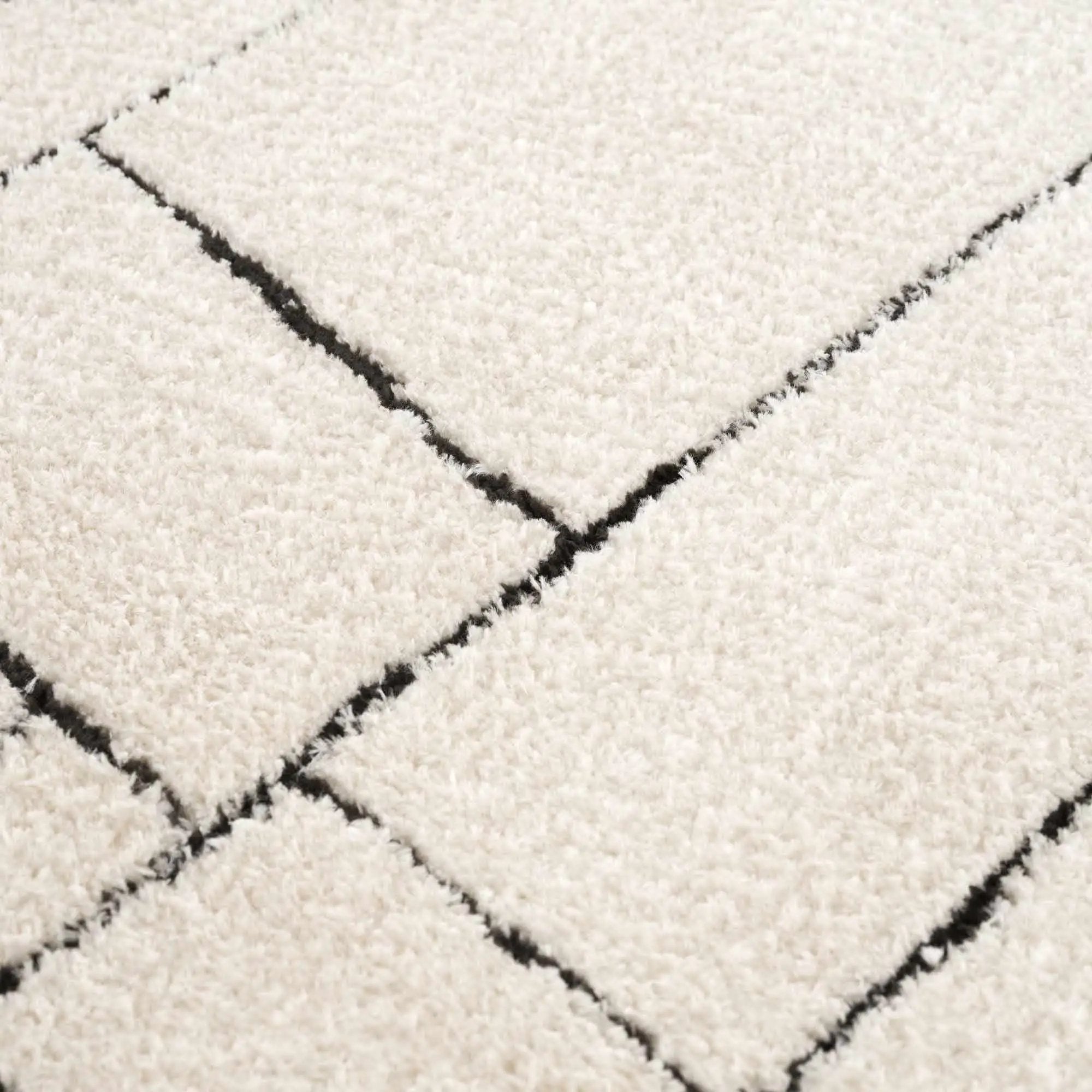 Keats Black & White Area Rug by Boutique Rugs
