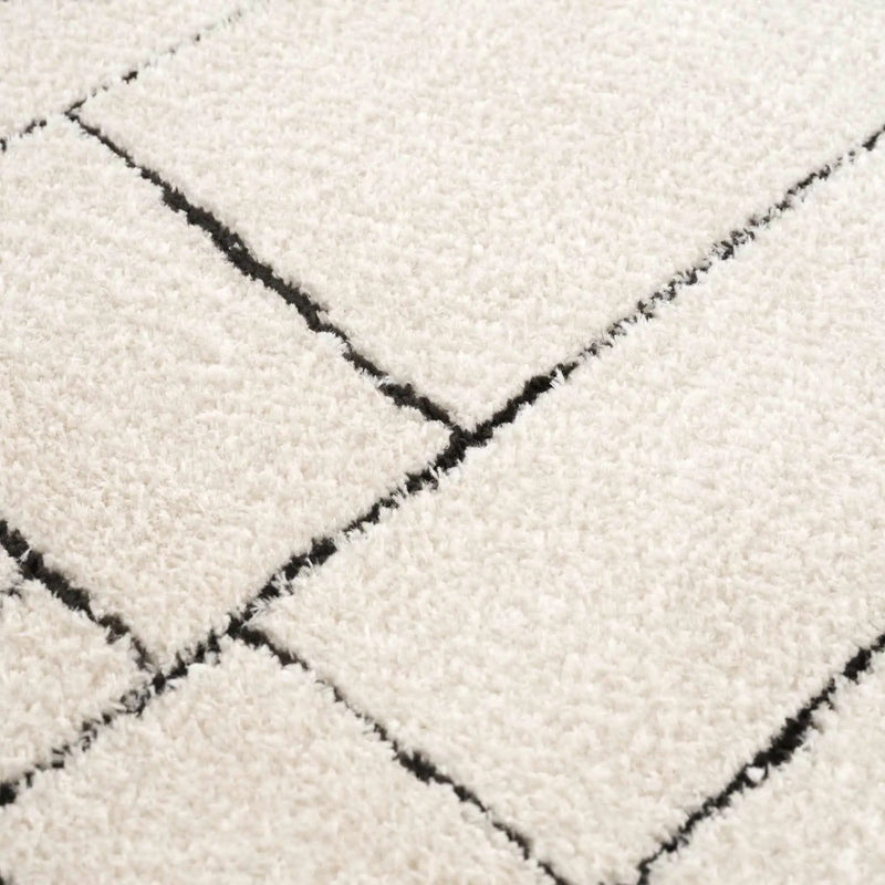 Keats Black & White Area Rug by Boutique Rugs