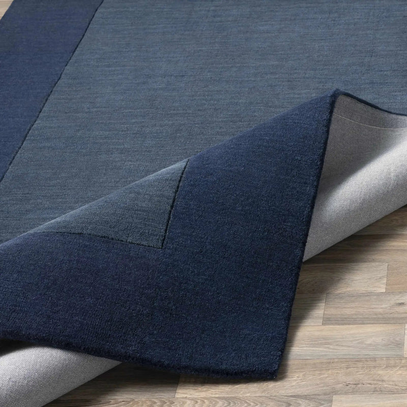 Bordered Solid Ink Blue Wool Rug by Boutique Rugs