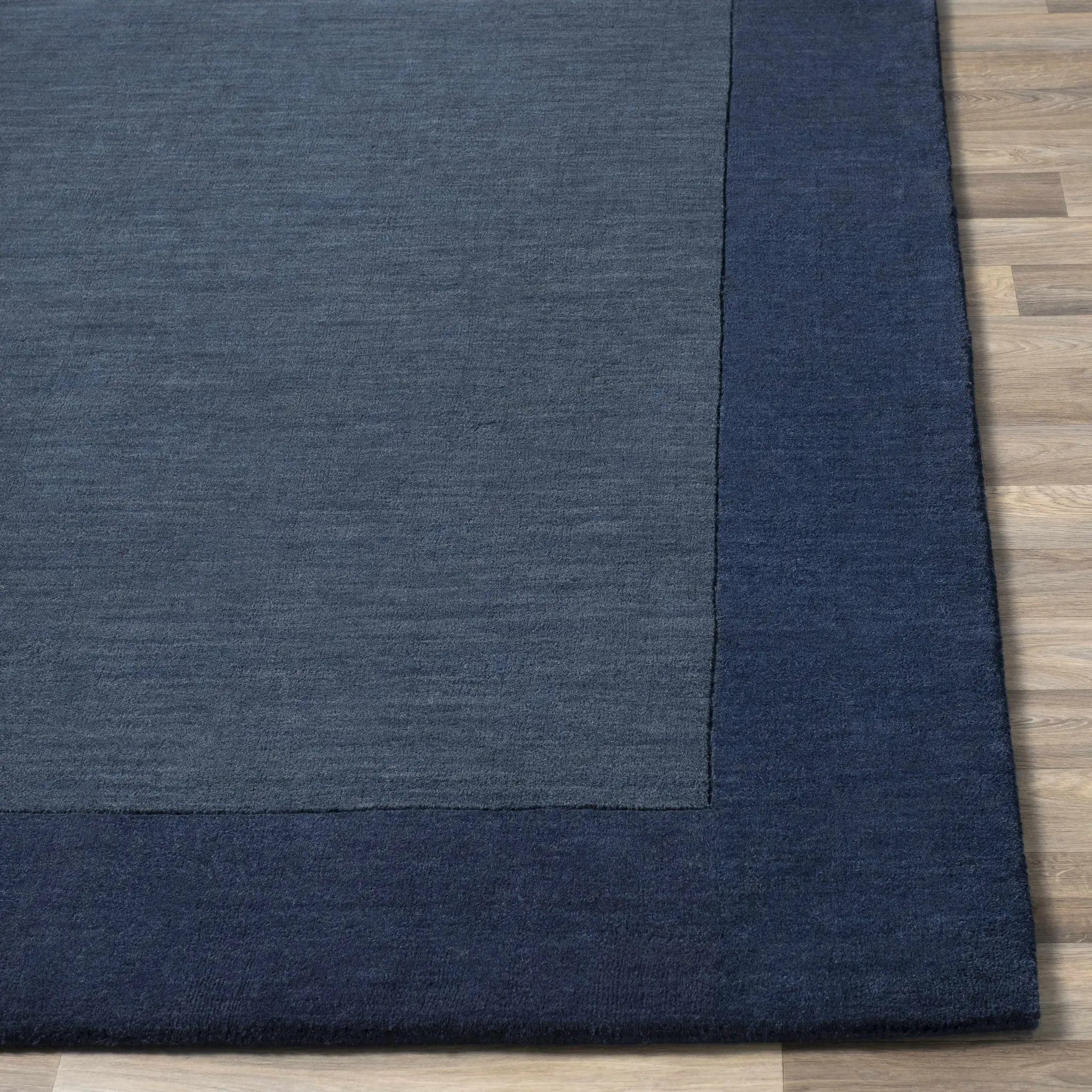 Bordered Solid Ink Blue Wool Rug by Boutique Rugs