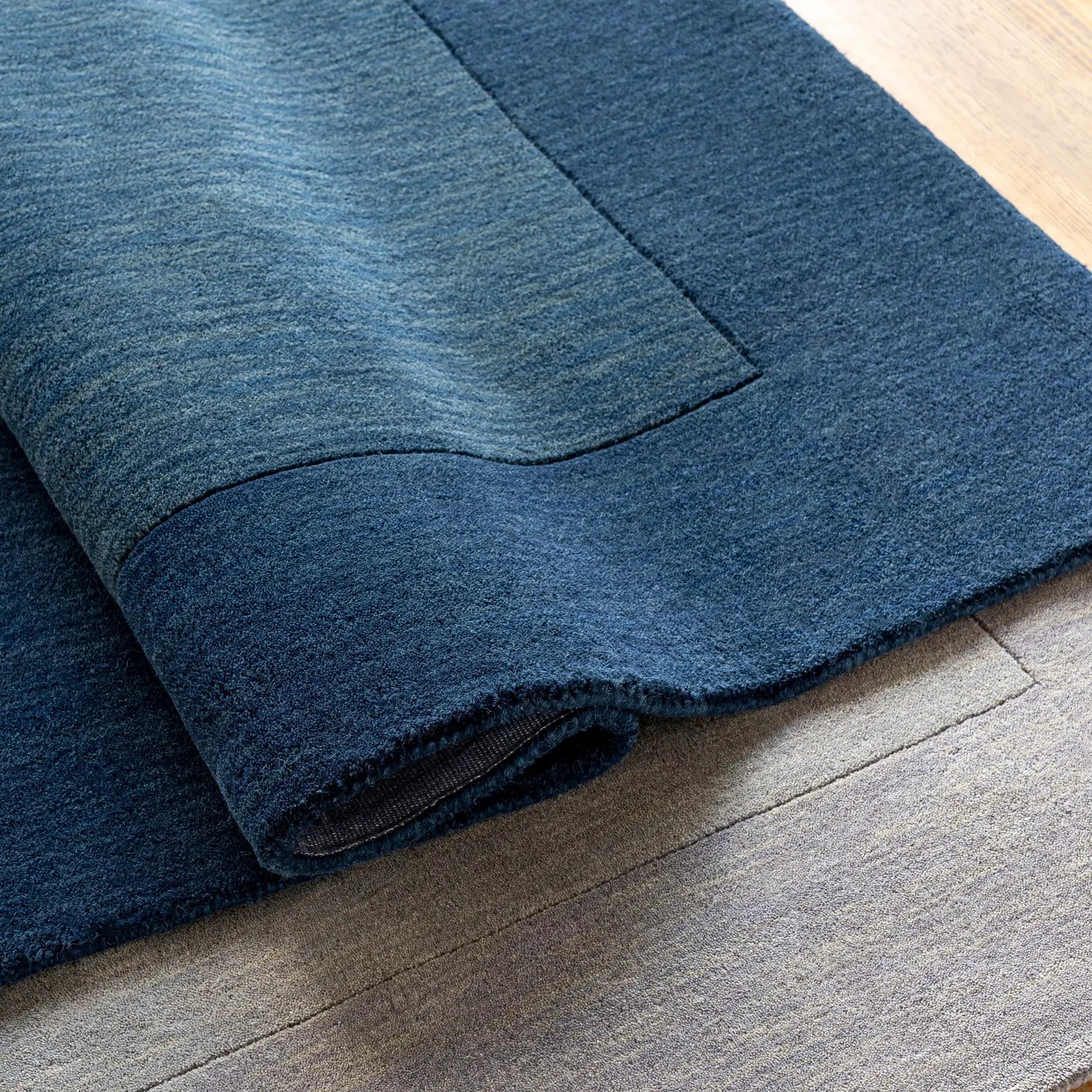 Bordered Solid Ink Blue Wool Rug by Boutique Rugs