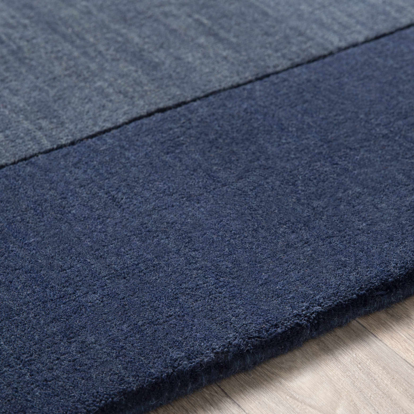 Bordered Solid Ink Blue Wool Rug by Boutique Rugs