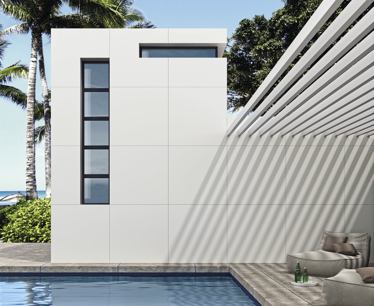 Forty8 Pure White Honed Marble Look Porcelain Tiles 48x48 installed in a room