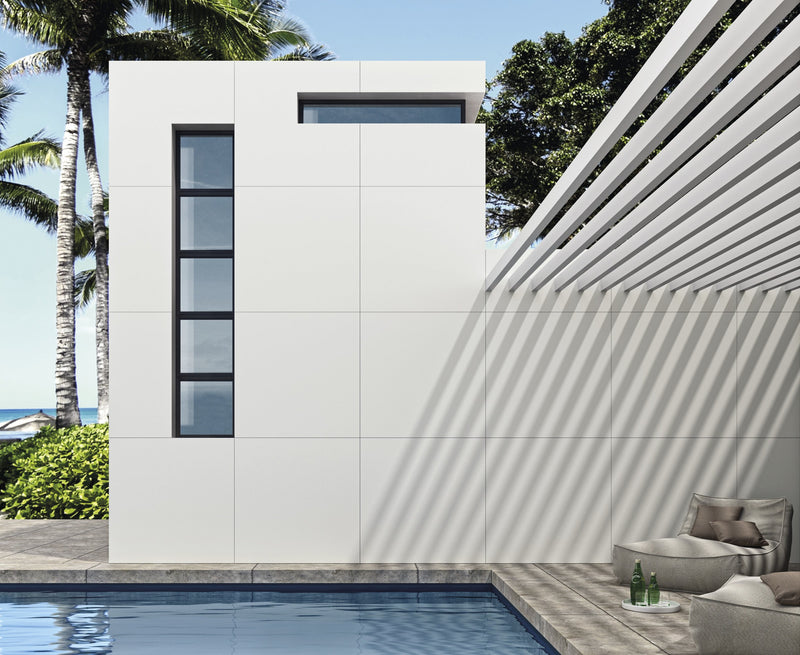 Forty8 Pure White Honed Marble Look Porcelain Tiles 48x48 installed in a room