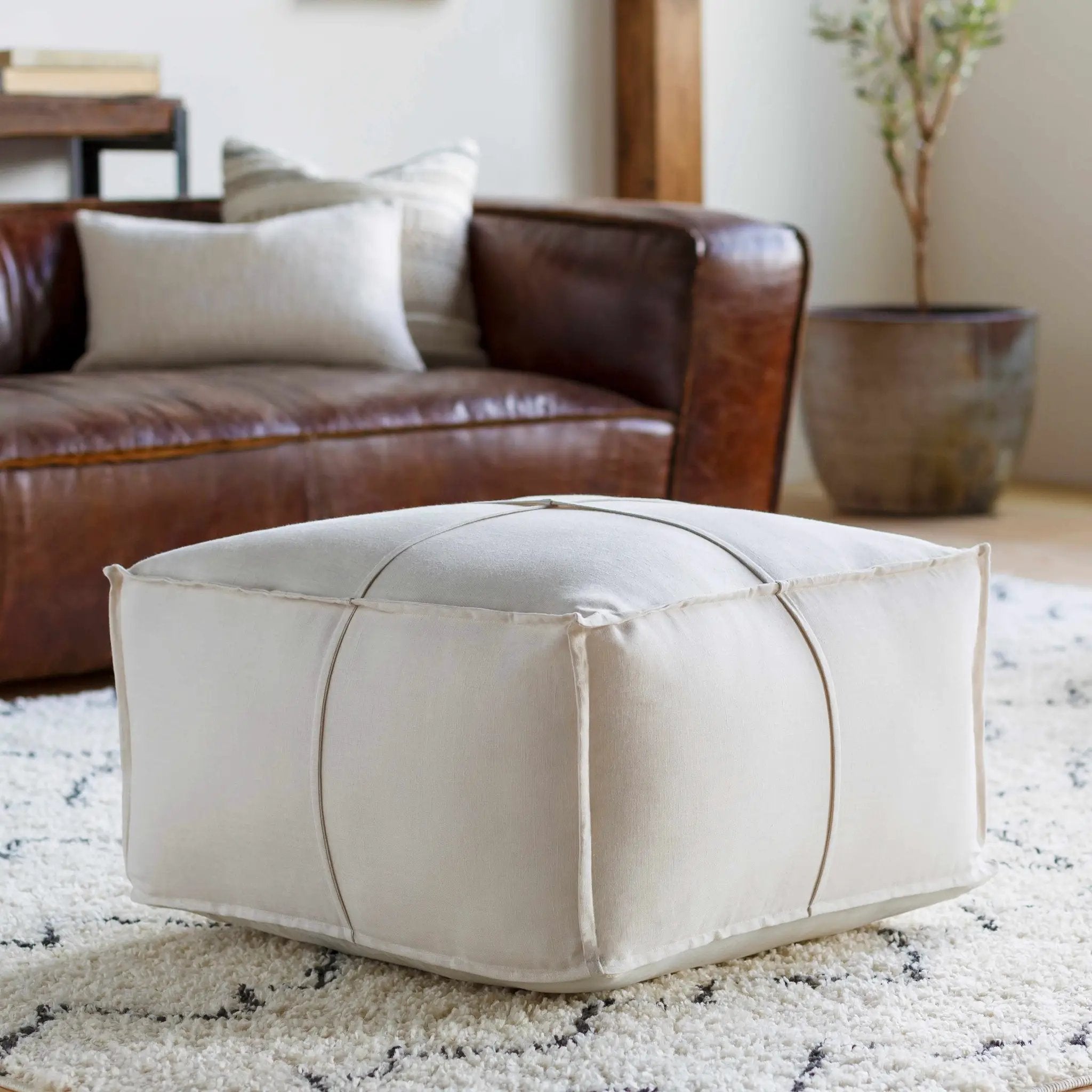 Friendsville Solid & Striped Ivory Pouf by Boutique Rugs