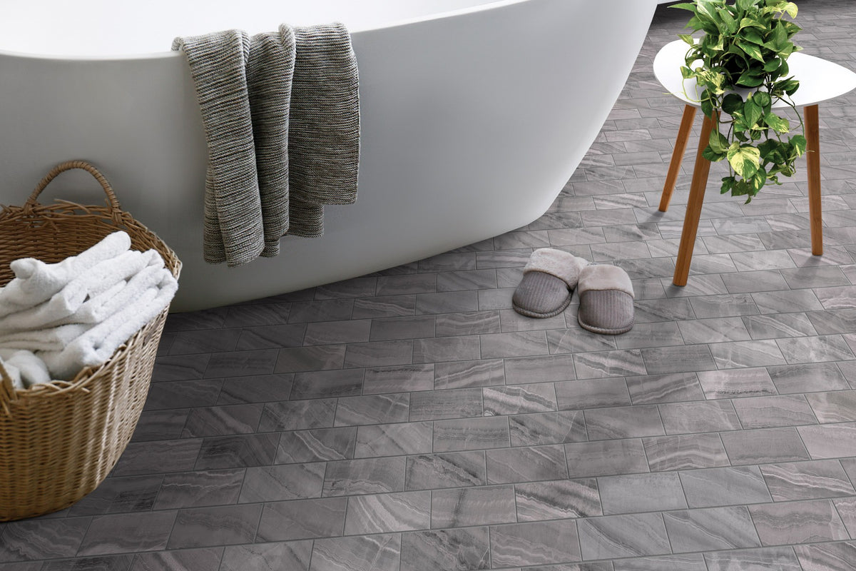 Gemma Grey Onyx Honed 2x6 Marble Look Porcelain Mosaics 12x12 installed in a bathroom