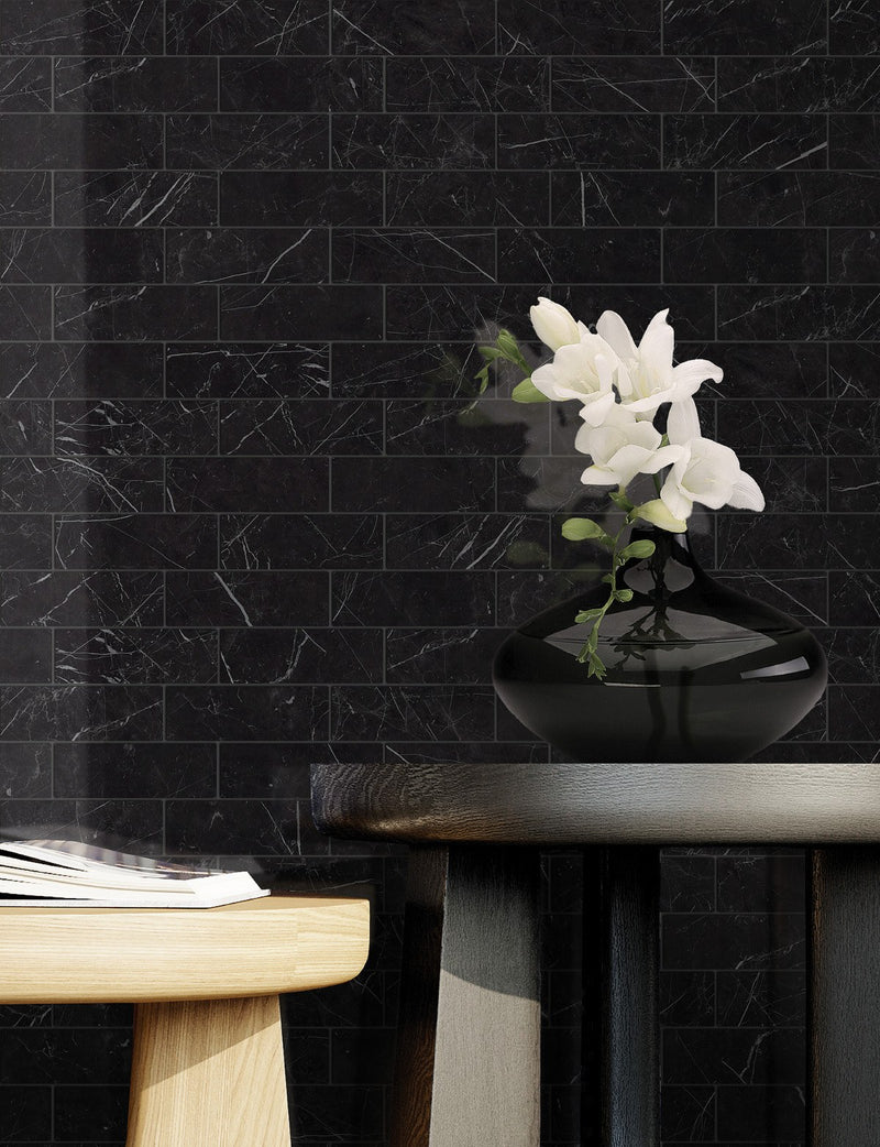 Gemma Notte Polished 2x6 Marble Look Porcelain Mosaics 12x12 installed in a living room