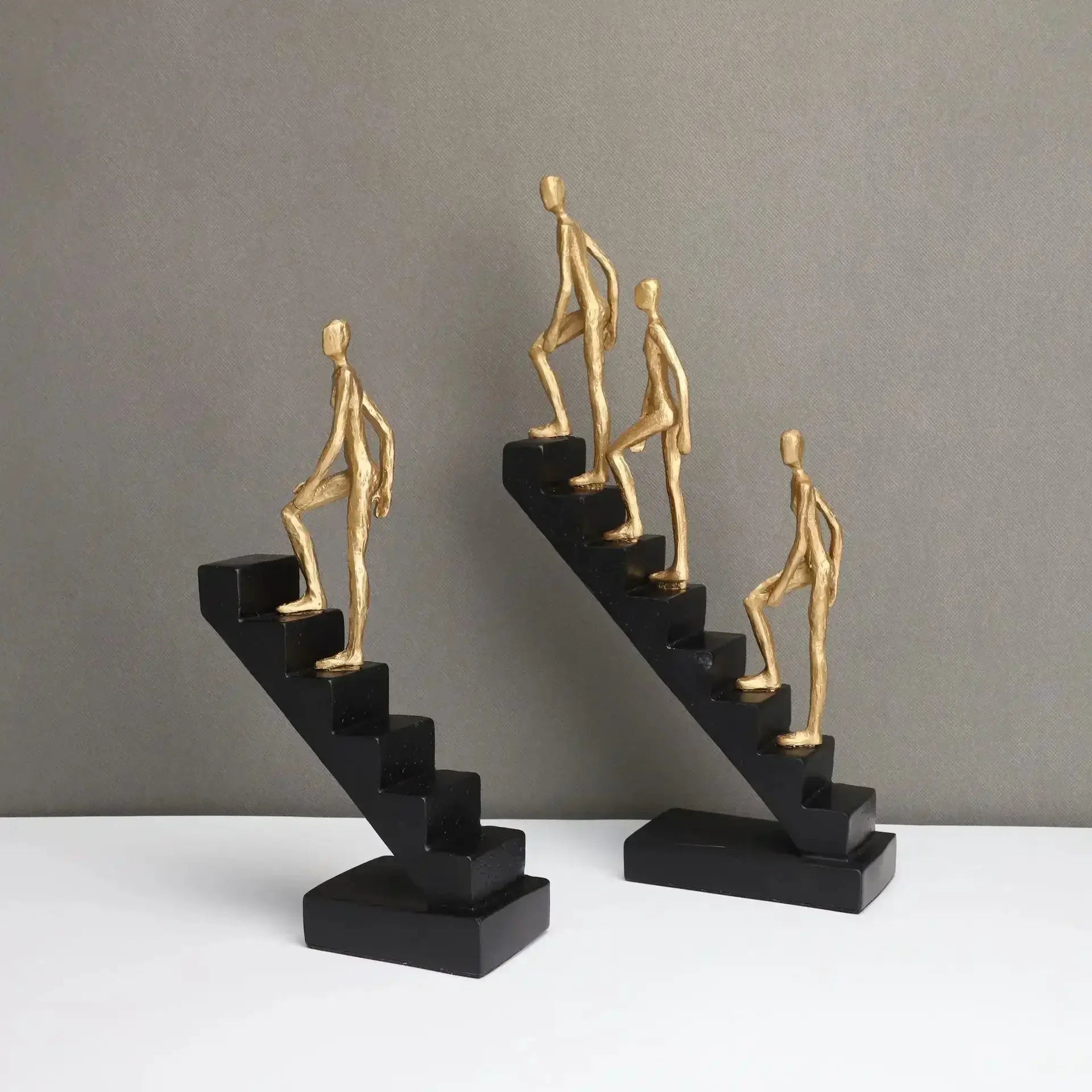 Modern Staircase Climbing Human Sculpture for Home Decor by House Of Avana