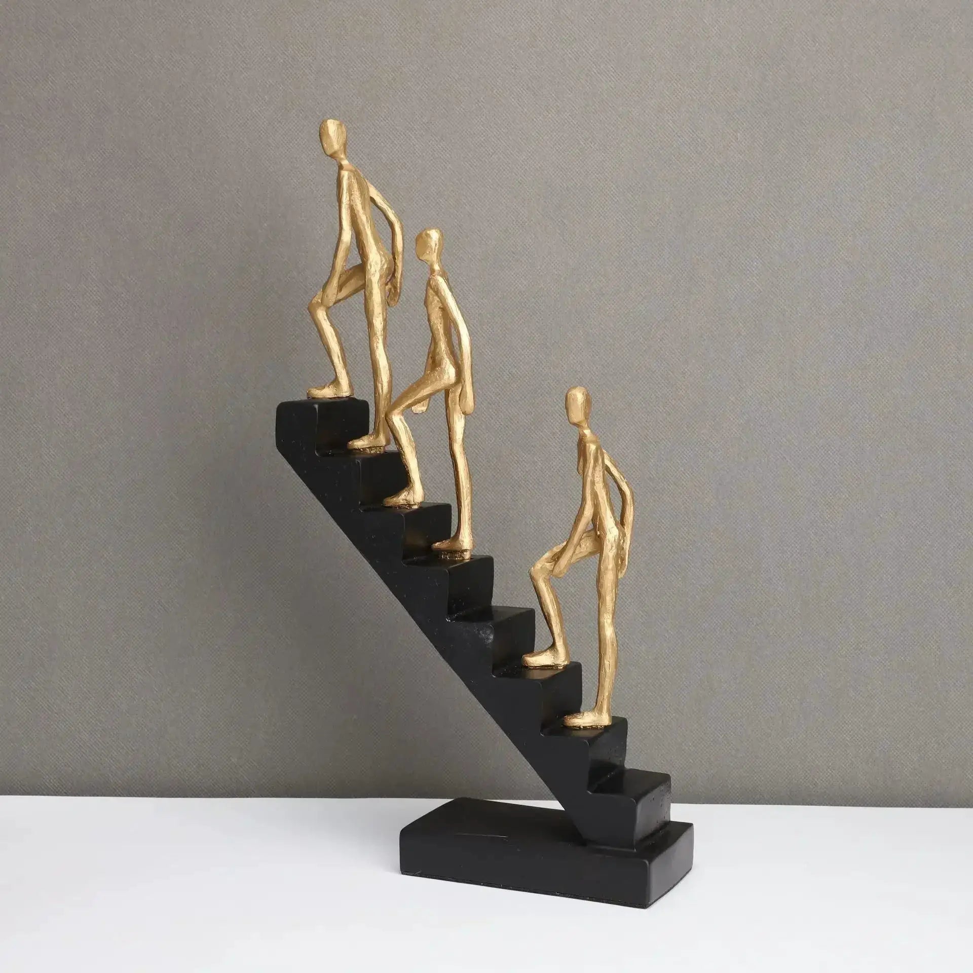 Modern Staircase Climbing Human Sculpture for Home Decor by House Of Avana