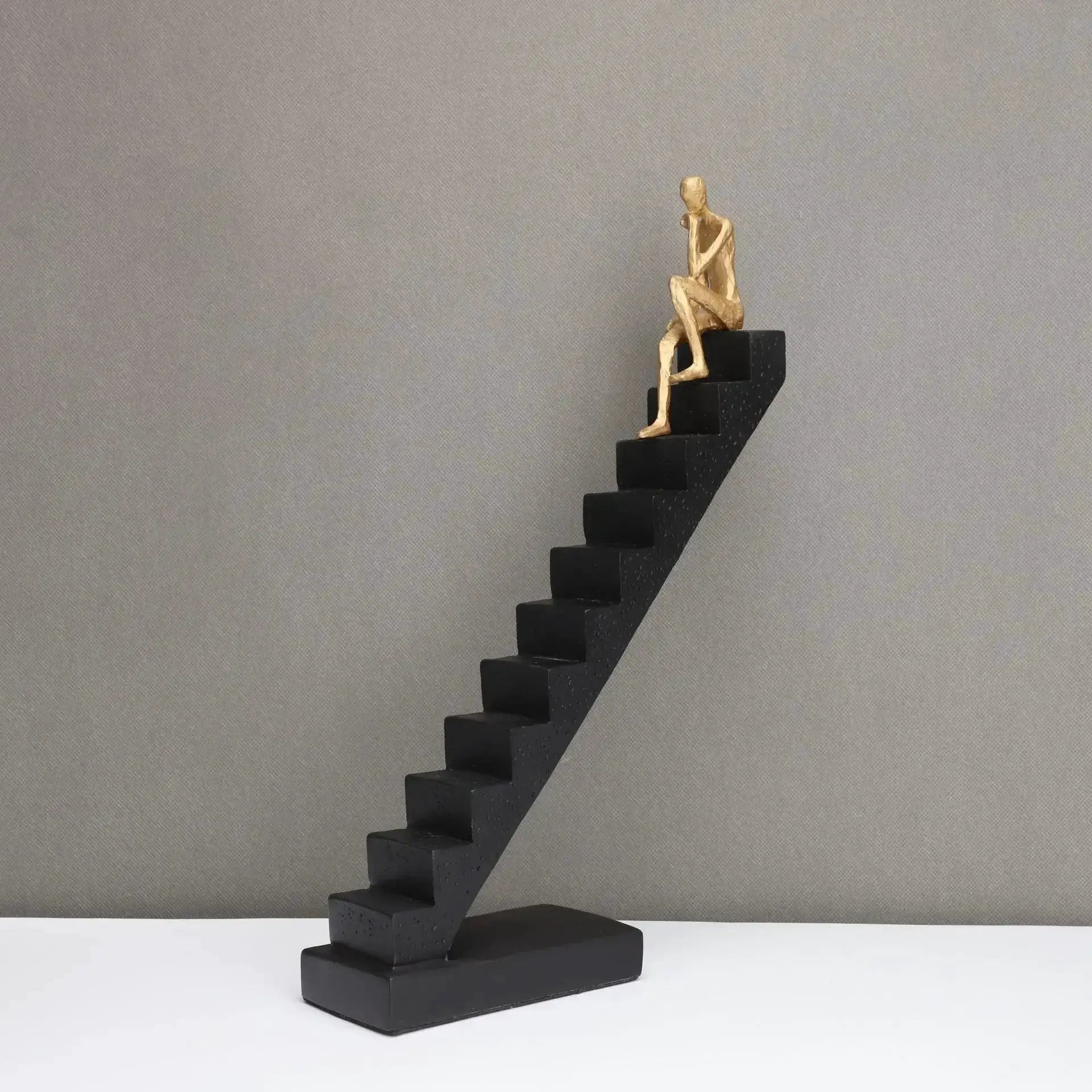 Modern Staircase Climbing Human Sculpture for Home Decor by House Of Avana