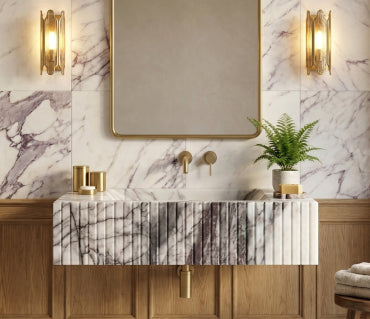Fluted marble wall-mounted bathroom sink with brass wall faucet