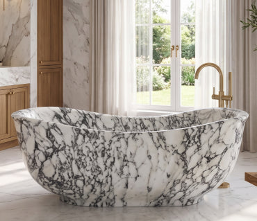 Freestanding viola marble bathtub beside a garden window