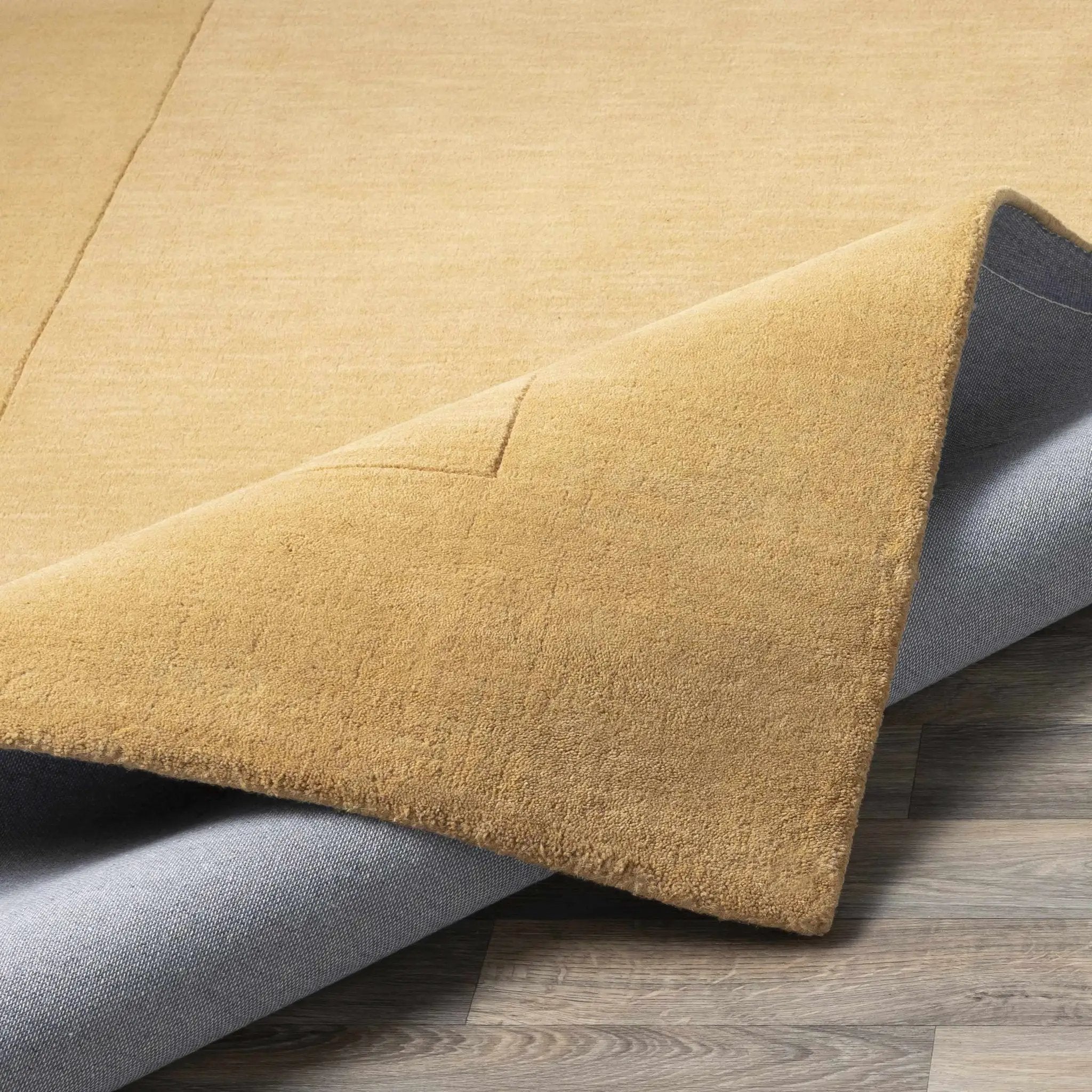 Bordered Solid Camel Yellow Wool Rug by Boutique Rugs